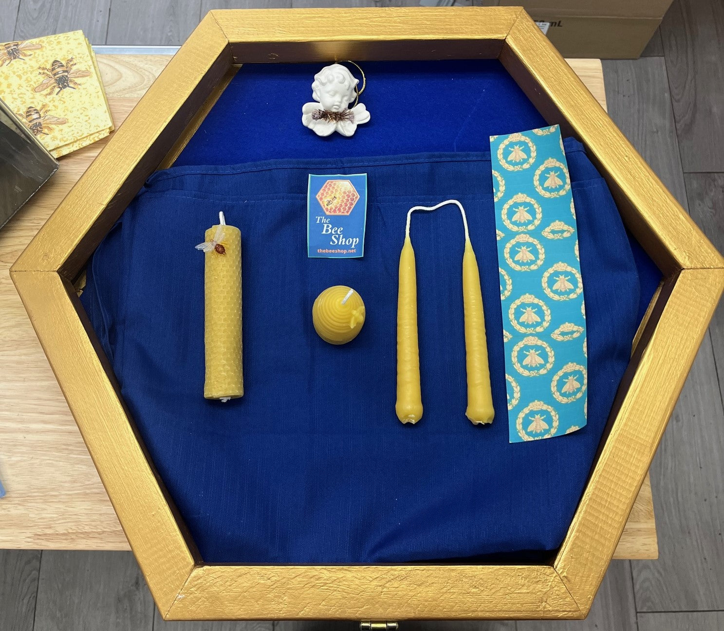 display of the 4 x 100 % pure beeswax candles that you get to make and keep from The Bee Shop&