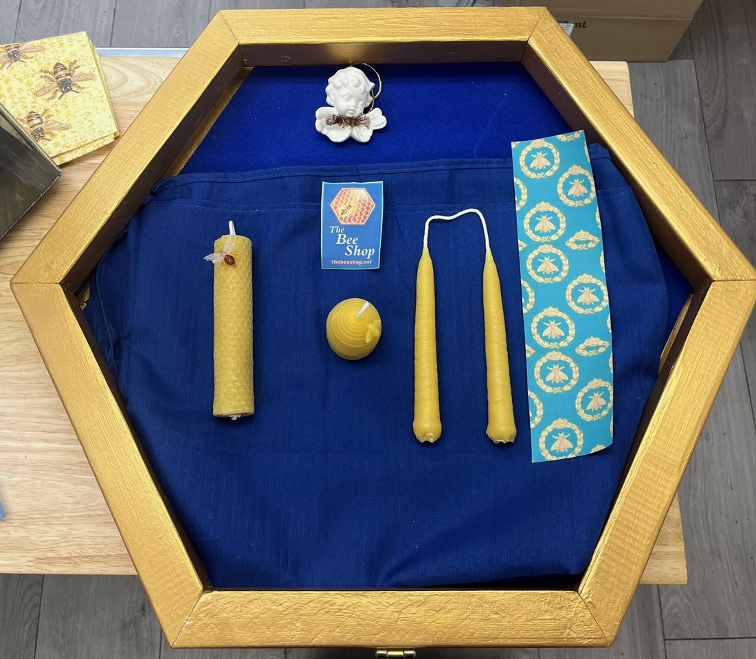 display of the 4 x 100 % pure beeswax candles that you get to make and keep from The Bee Shop&