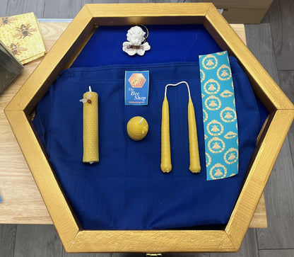 display of the 4 x 100 % pure beeswax candles that you get to make and keep from The Bee Shop&