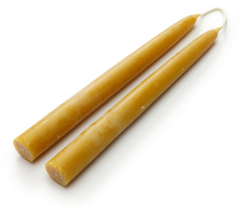 Pair of beeswax taper candles front view